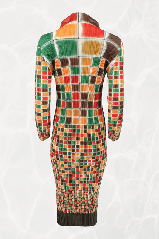 Pleats Please Issey Miyake SS94 sculptural mosaic print midi dress back view: full-length rear view showing multicolor grid print in red, orange, green, and brown on pleated fabric, long sleeves, Spring/Summer 1994