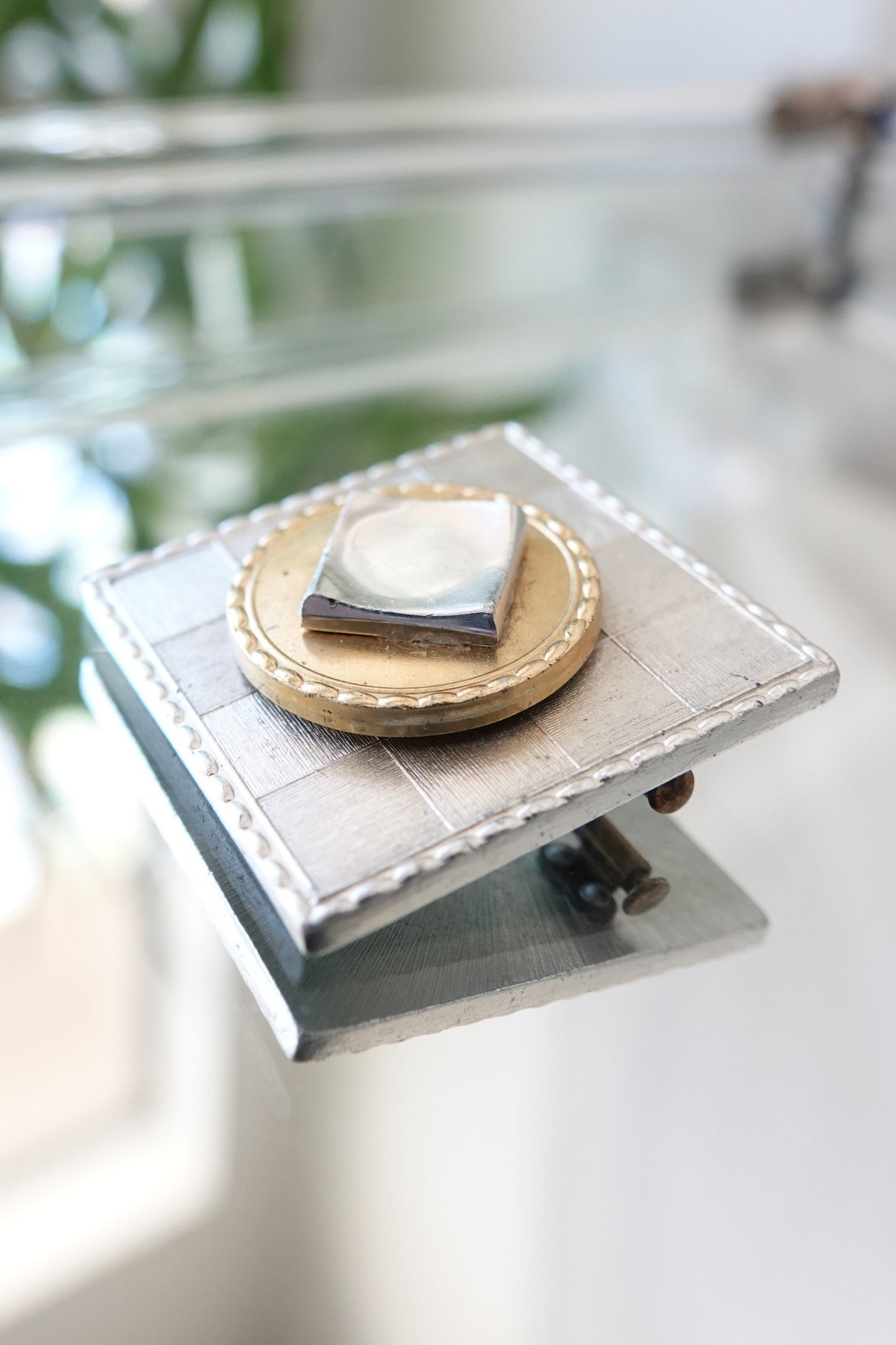 Vintage mixed metal square brooch, side angle showing depth — styled on stone prop — Disco Palma