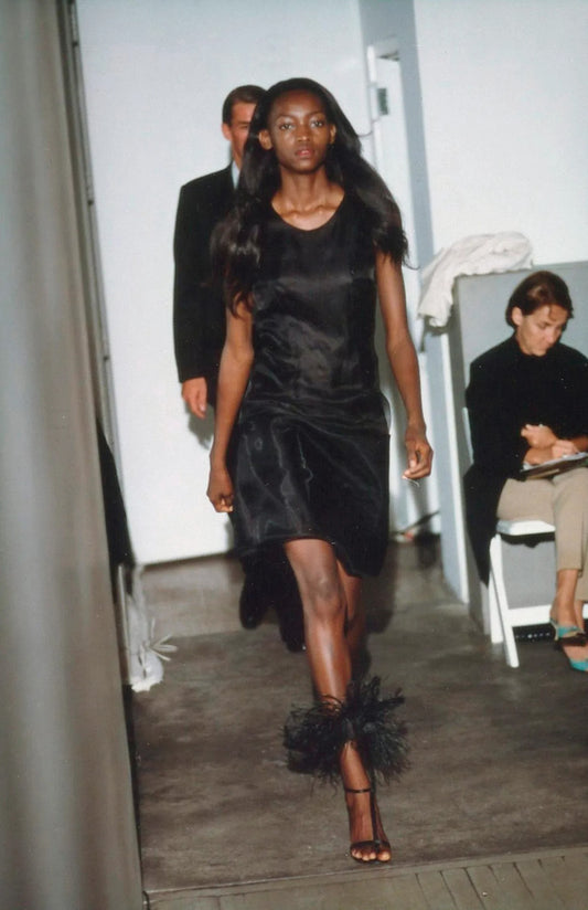 Helmut Lang SS00 silk organza balloon shift dress: original Spring 2000 RTW runway look 51, model on catwalk showing the sleeveless black organza dress with balloon hem, Spring/Summer 2000