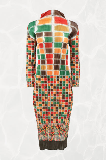 Pleats Please Issey Miyake SS94 sculptural mosaic print midi dress front view: full-length multicolor grid print in red, orange, green, and brown on pleated fabric, long sleeves, high neck, Spring/Summer 1994
