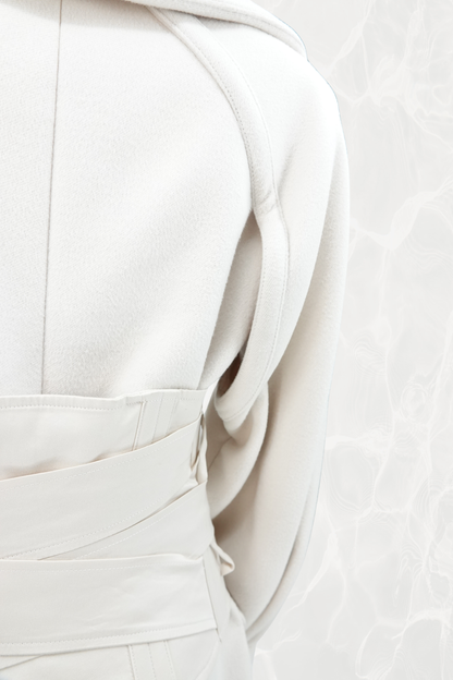Tom Ford for Gucci AW03 white wool angora corset coat detail: close-up of architectural cut-out underarm construction and corset waist cincher belt, Fall Winter 2003