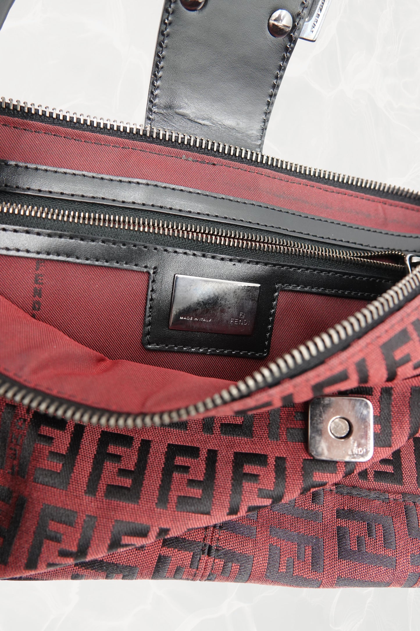 Fendi Zucchino FF monogram baguette, open interior showing MADE IN ITALY stamp — Disco Palma