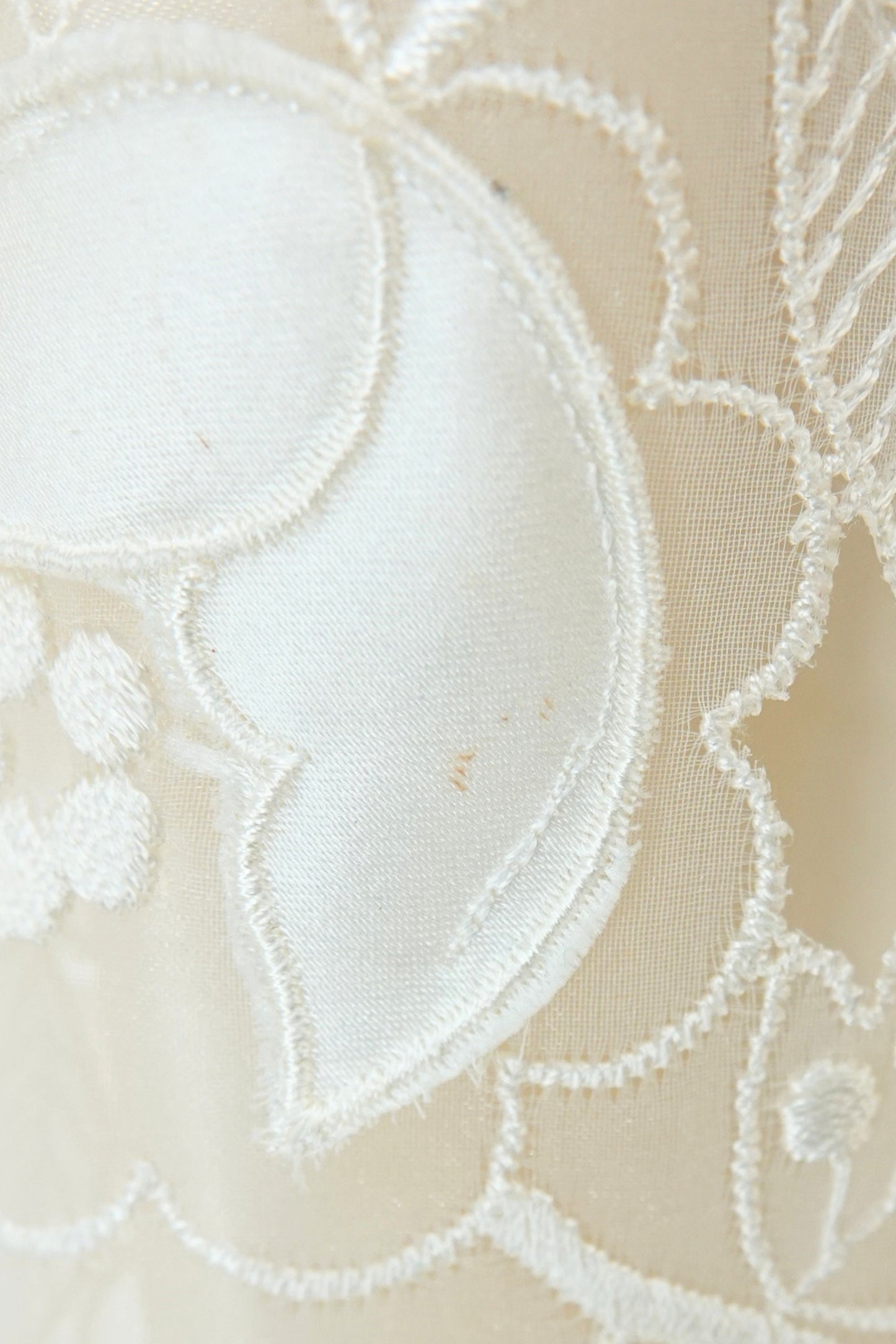 Condition detail — George F. Couture ivory ball gown