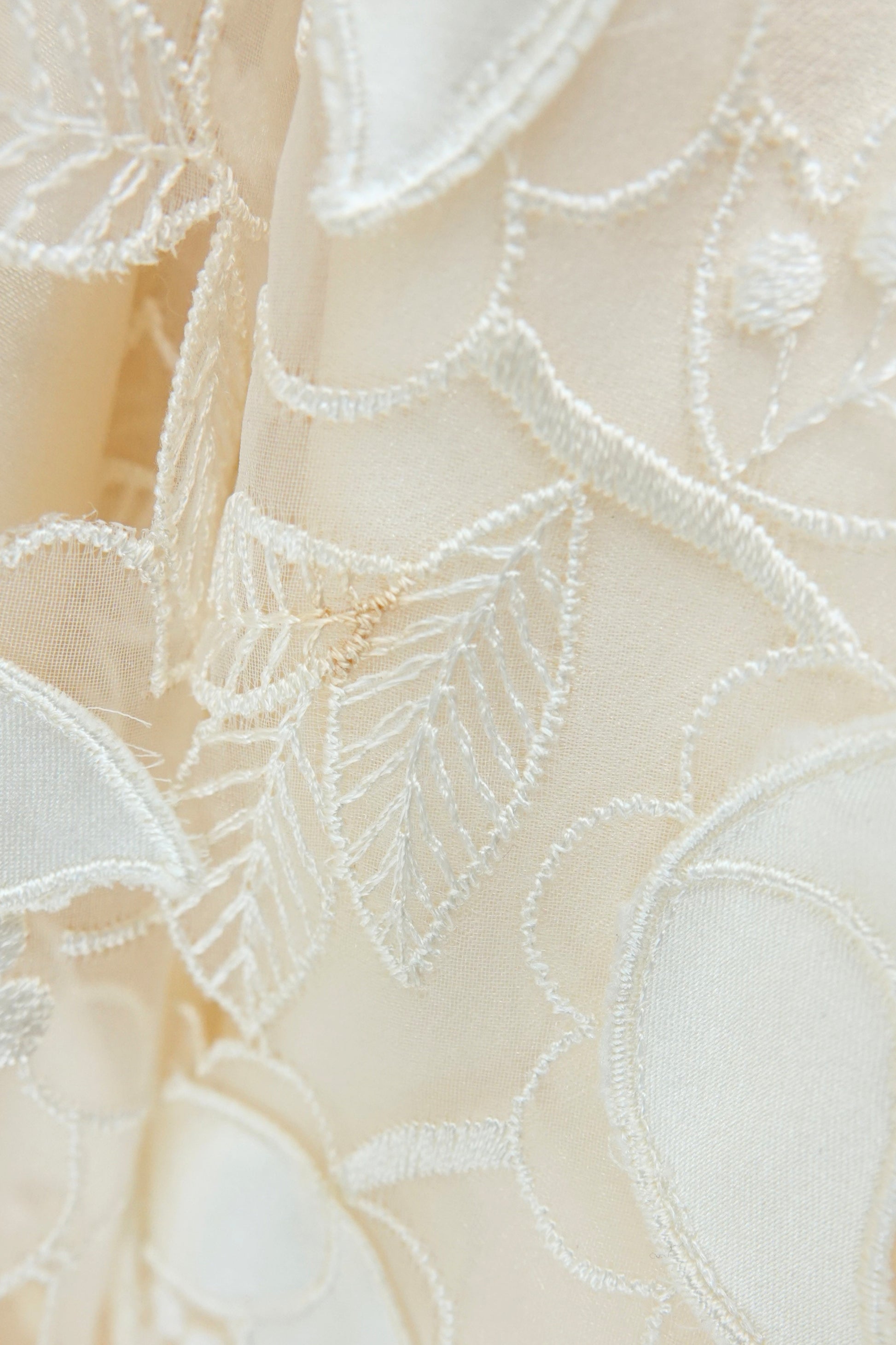Condition detail — George F. Couture ivory ball gown
