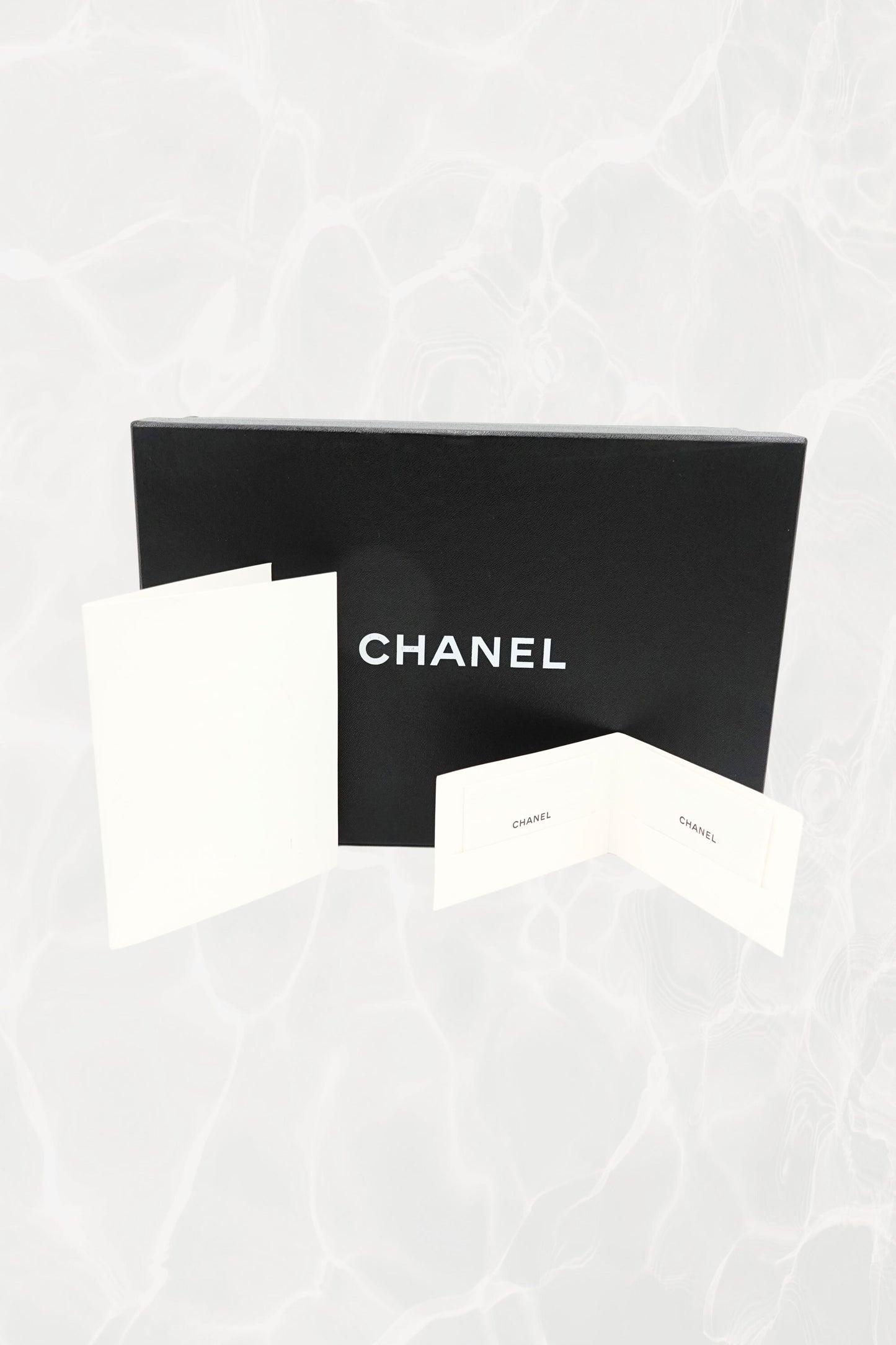 Chanel black grosgrain and satin bow slingback flats, full pair on white — Disco Palma