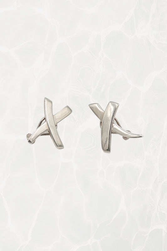 Vintage 1985 Paloma Picasso for Tiffany & Co. sterling silver Kiss X stud earrings: front view showing both earrings with iconic X and kiss motif design