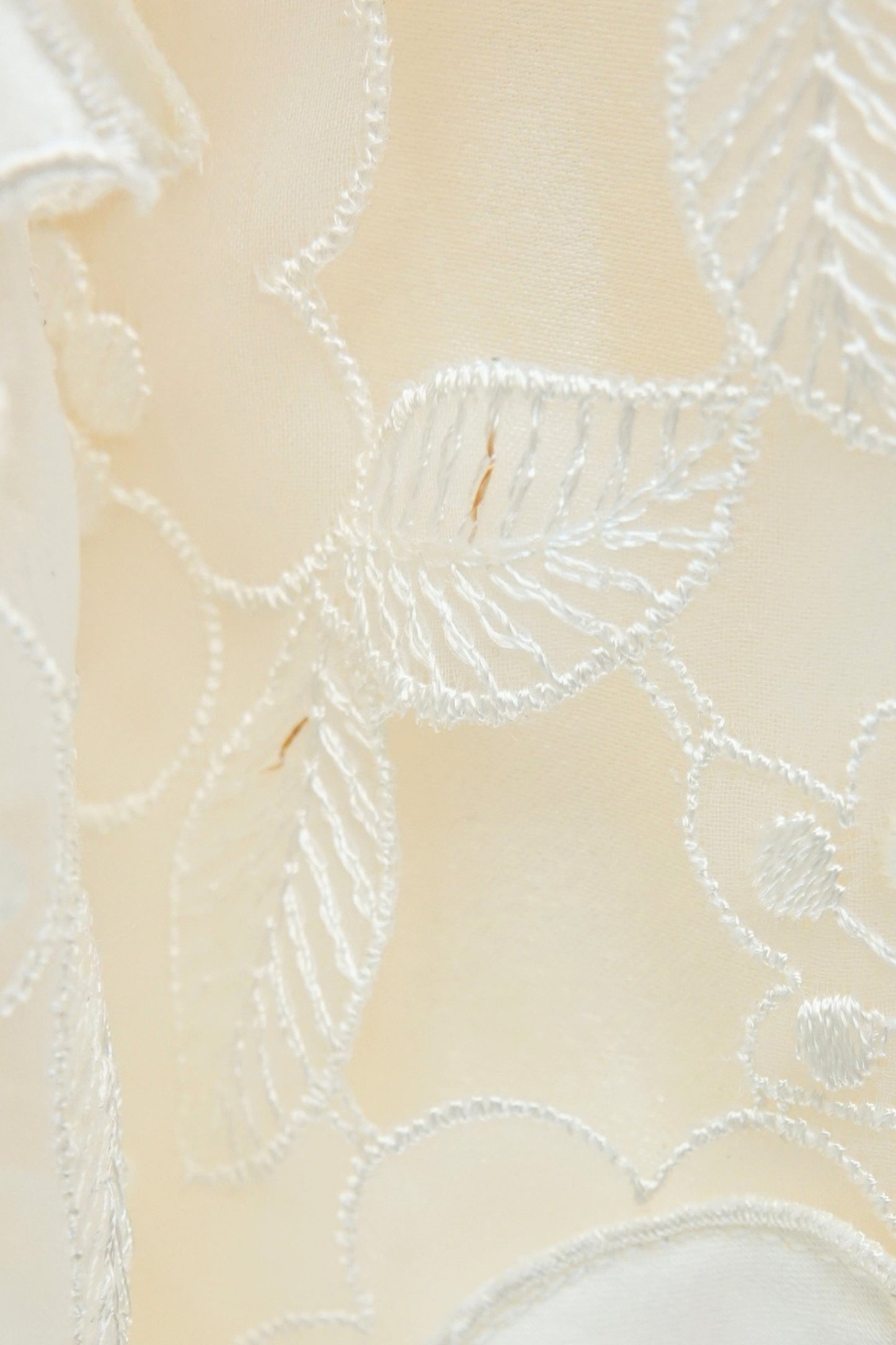 Condition detail — George F. Couture ivory ball gown