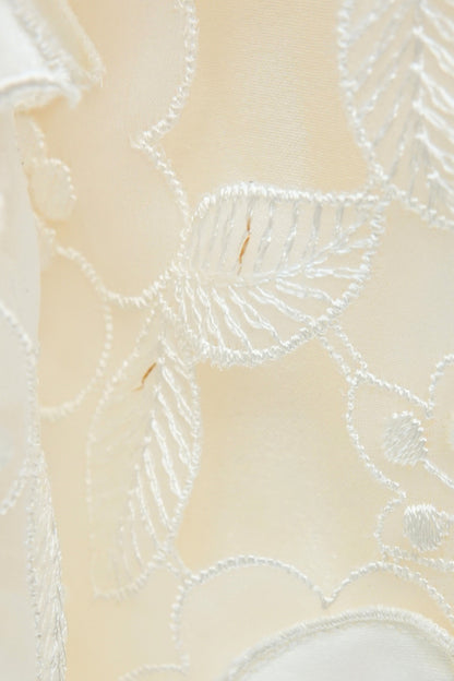 Condition detail — George F. Couture ivory ball gown