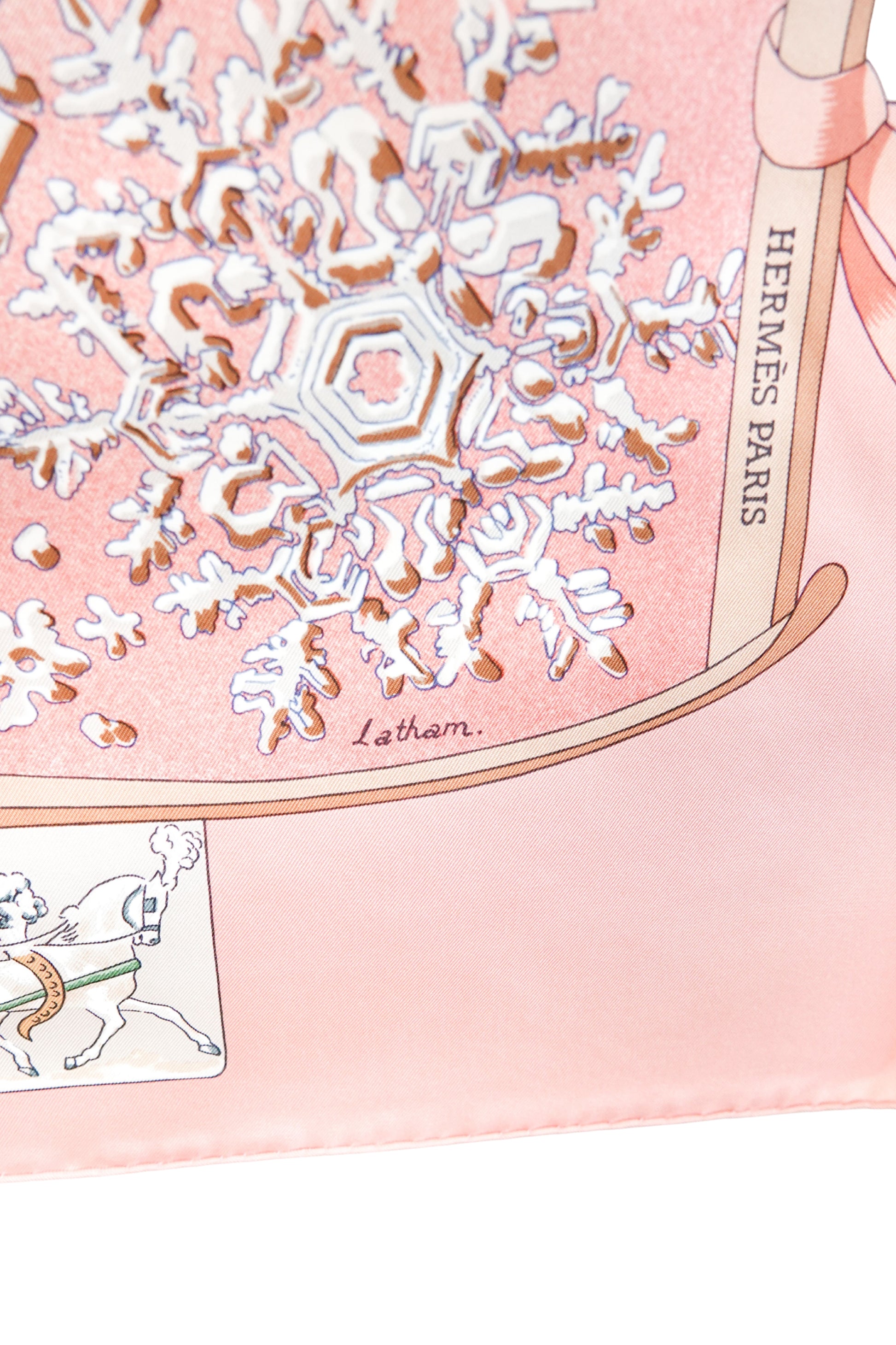 Hermès Neige d'Antan Carré 90 detail: HERMÈS PARIS label, snowflake and equestrian vignette, designer signature Latham