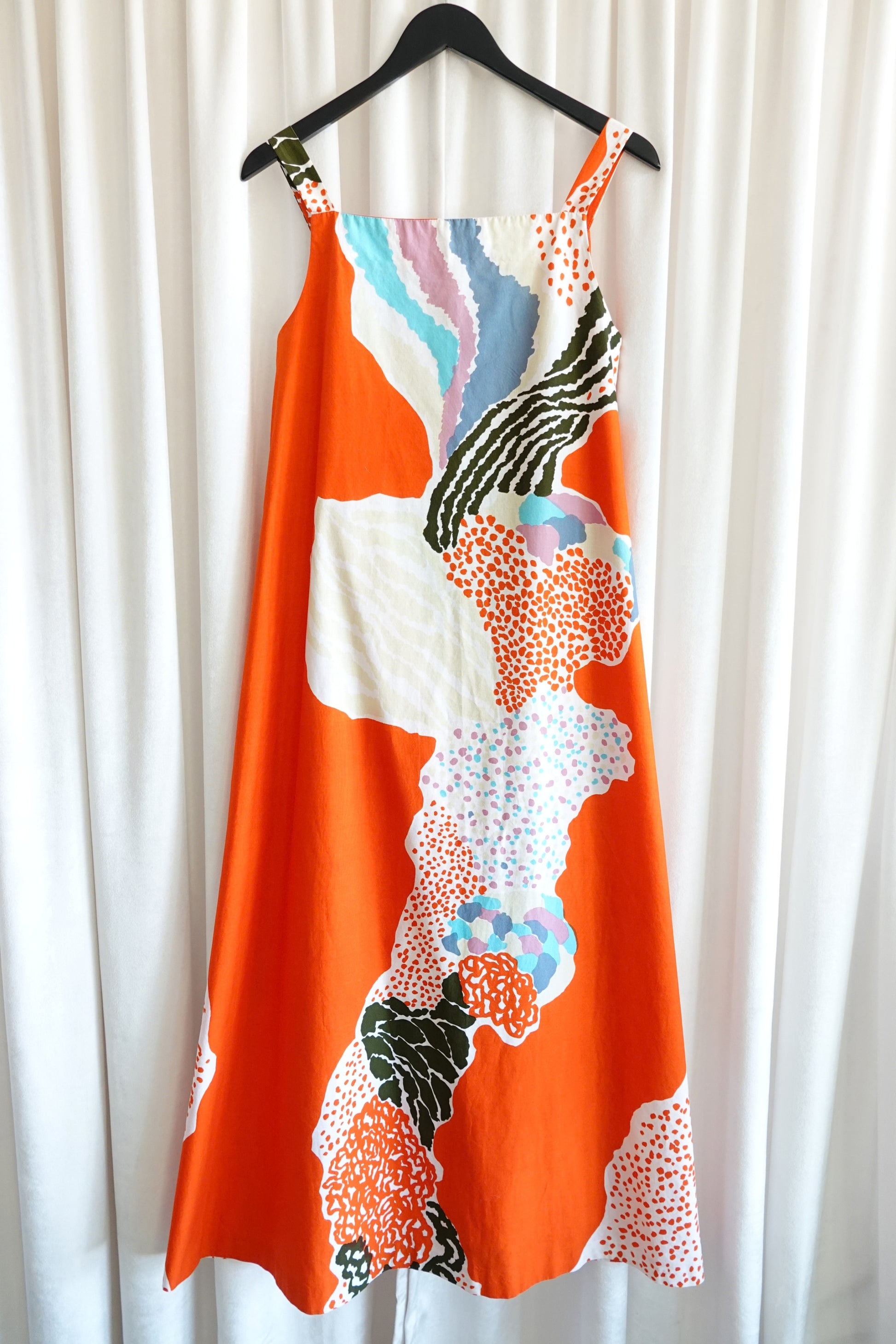 Marimekko 1978 orange abstract print maxi dress, back on hanger — Disco Palma