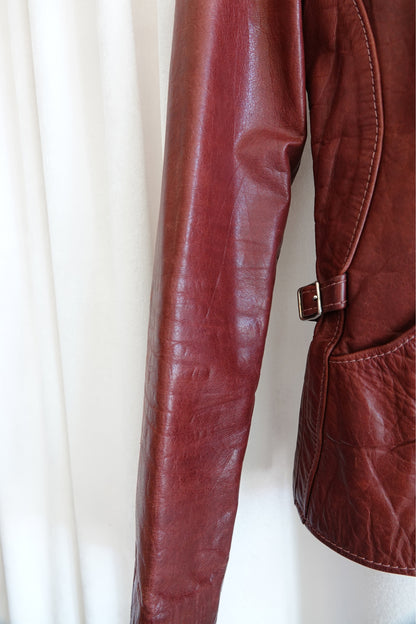 East West Musical Instruments 1970s burgundy leather jacket, condition detail — Disco Palma