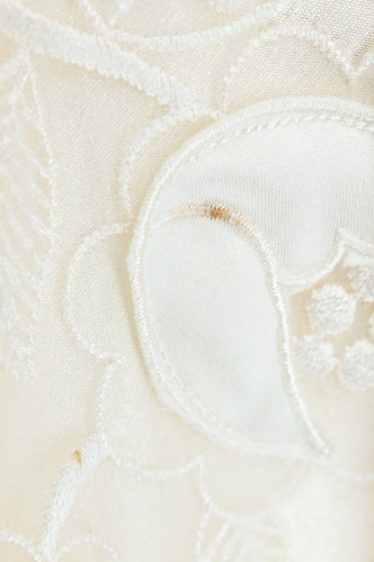 Condition detail — George F. Couture ivory ball gown