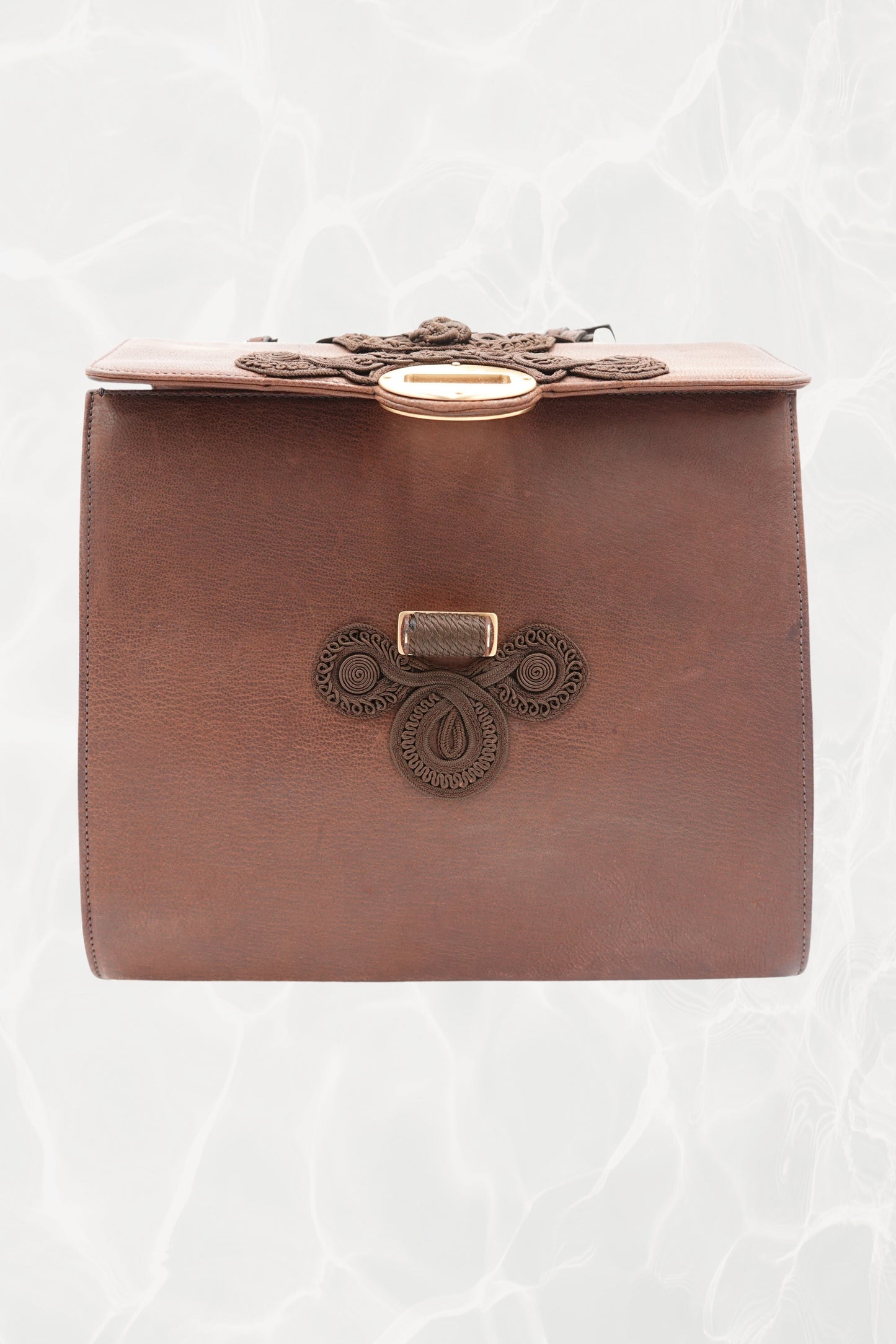 Hardware detail showing gold-tone metal on vintage Prada Antic Passamane bag