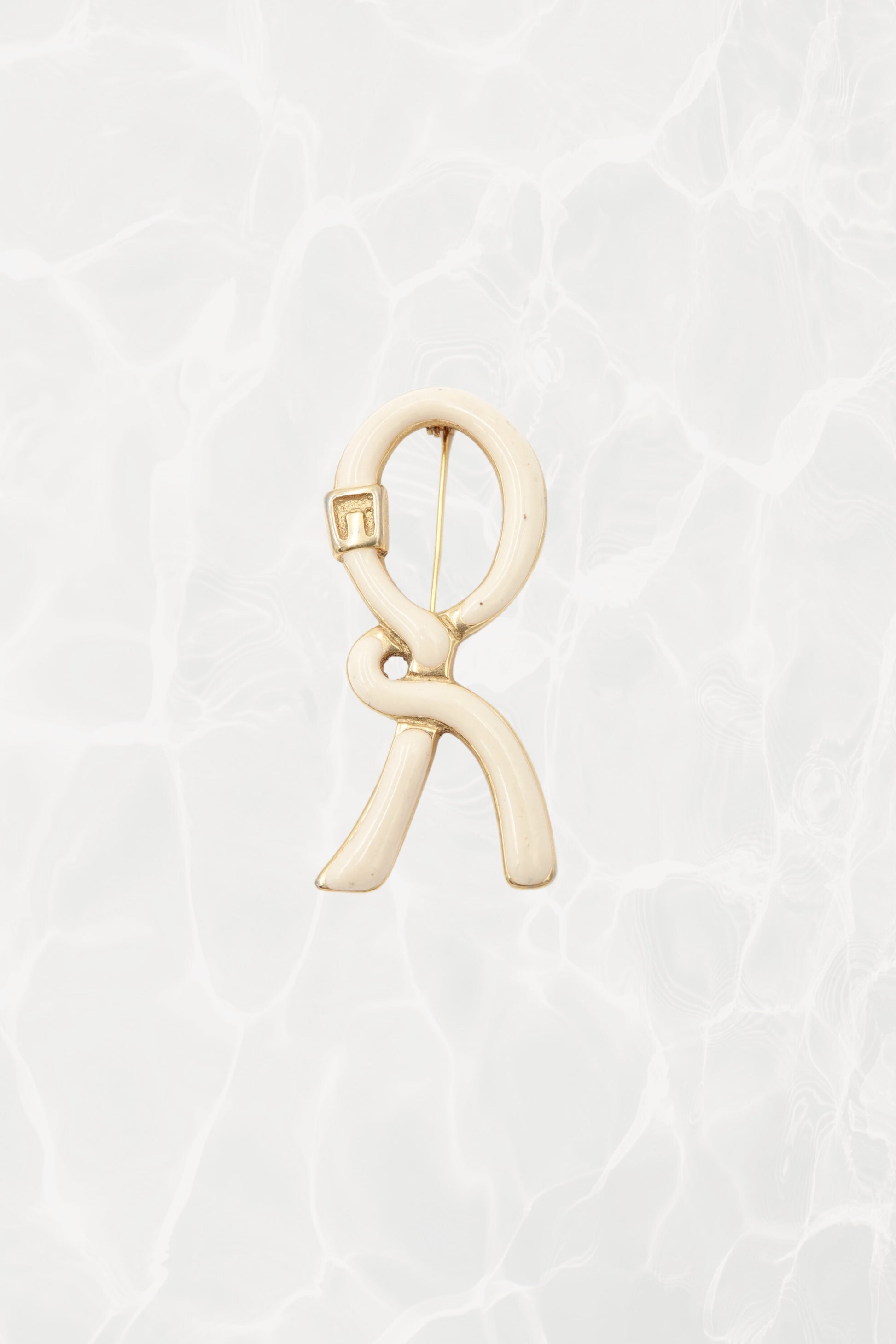 1980's Cream & Gold Enamel Ribbon “R” Logo Brooch