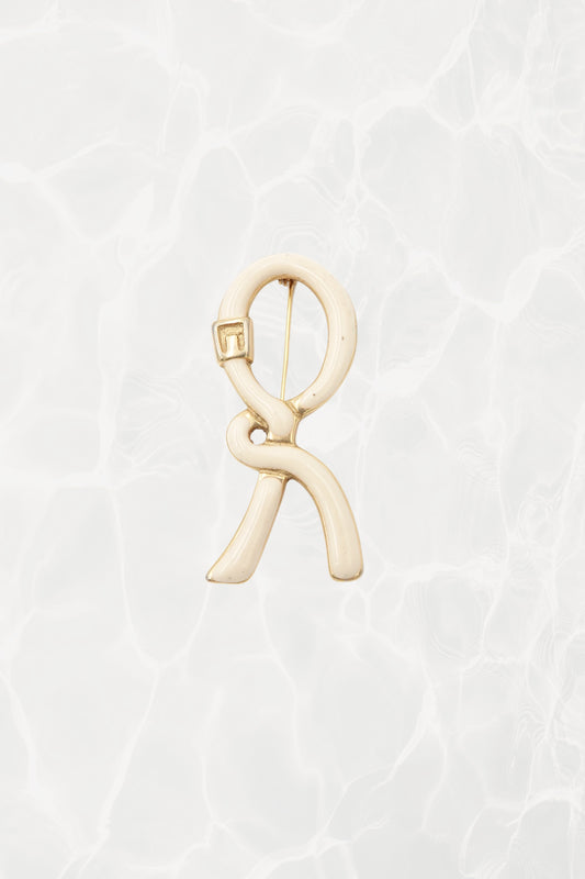 1980's Cream & Gold Enamel Ribbon “R” Logo Brooch