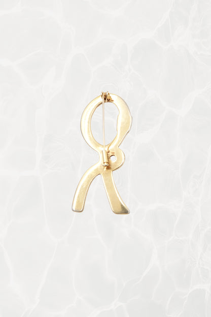 1980's Cream & Gold Enamel Ribbon “R” Logo Brooch