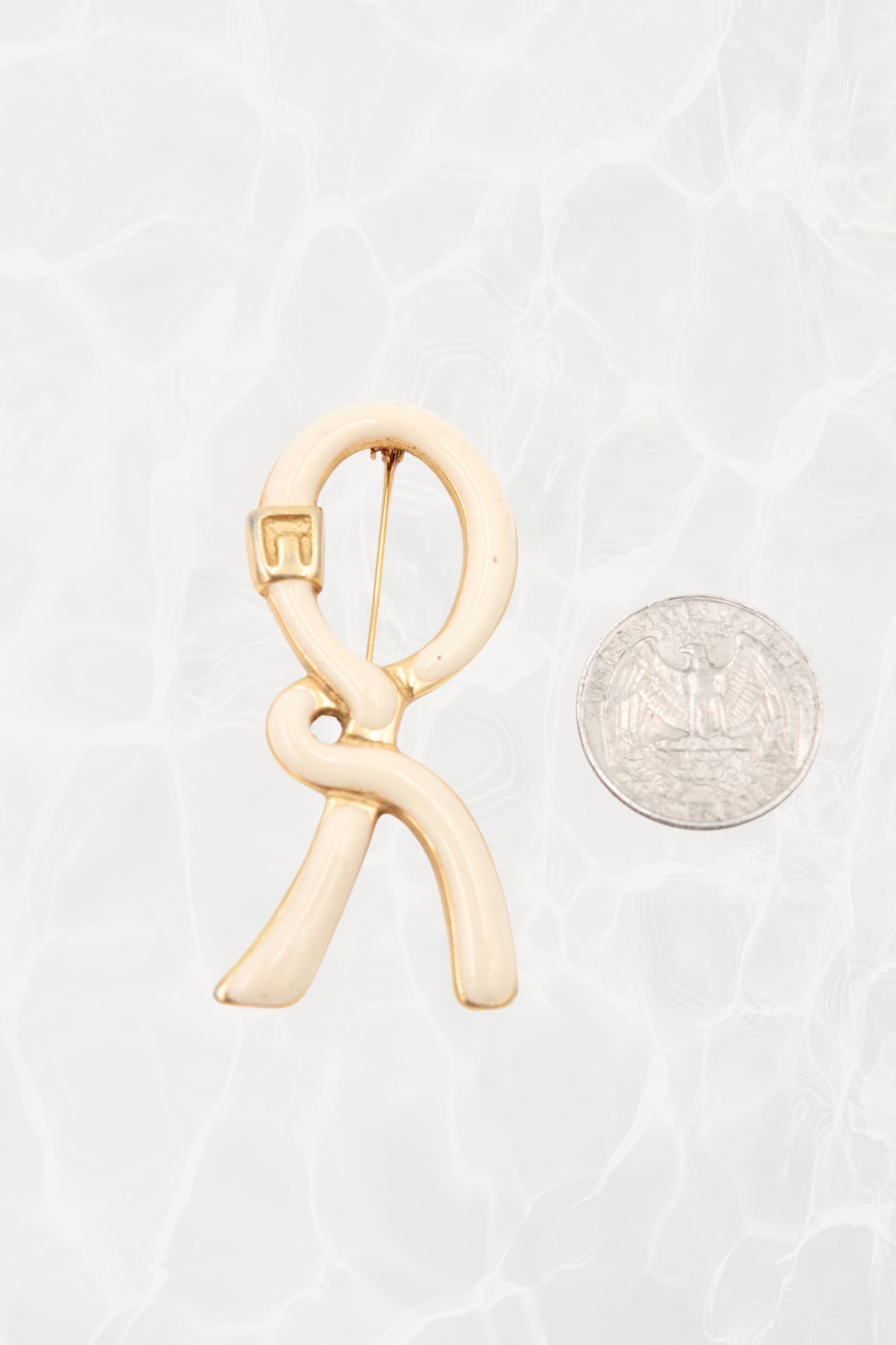 1980's Cream & Gold Enamel Ribbon “R” Logo Brooch