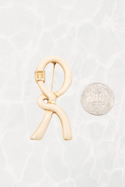 1980's Cream & Gold Enamel Ribbon “R” Logo Brooch