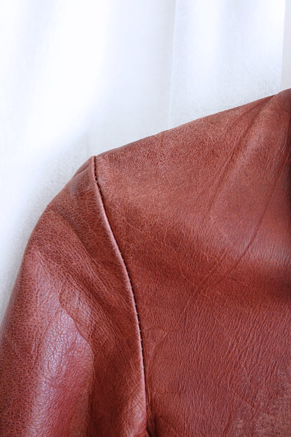 East West Musical Instruments 1970s burgundy leather jacket, sleeve wear detail — Disco Palma