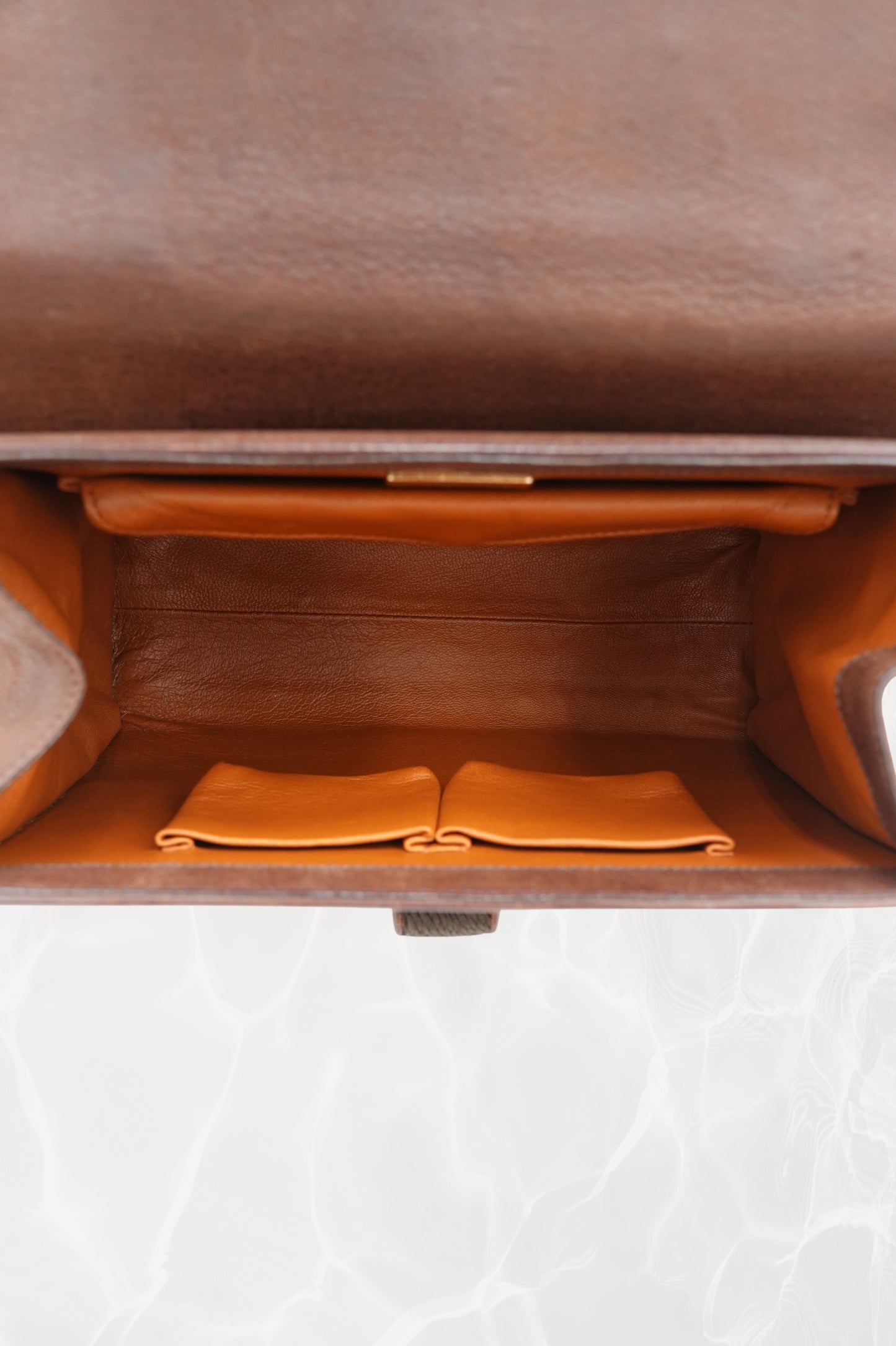Natural patina detail on vintage 1990s Prada Antic Passamane goat leather bag