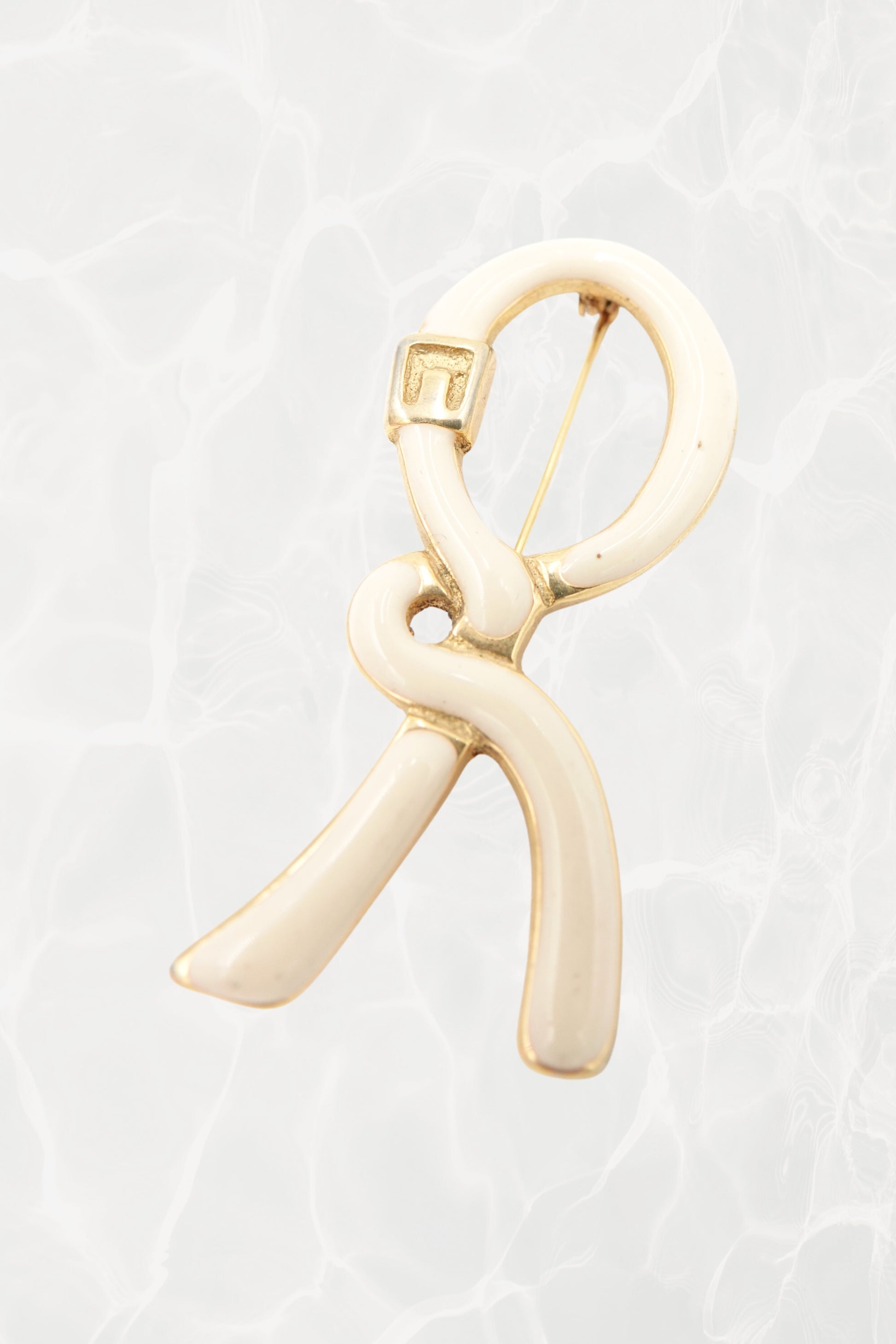 1980's Cream & Gold Enamel Ribbon “R” Logo Brooch