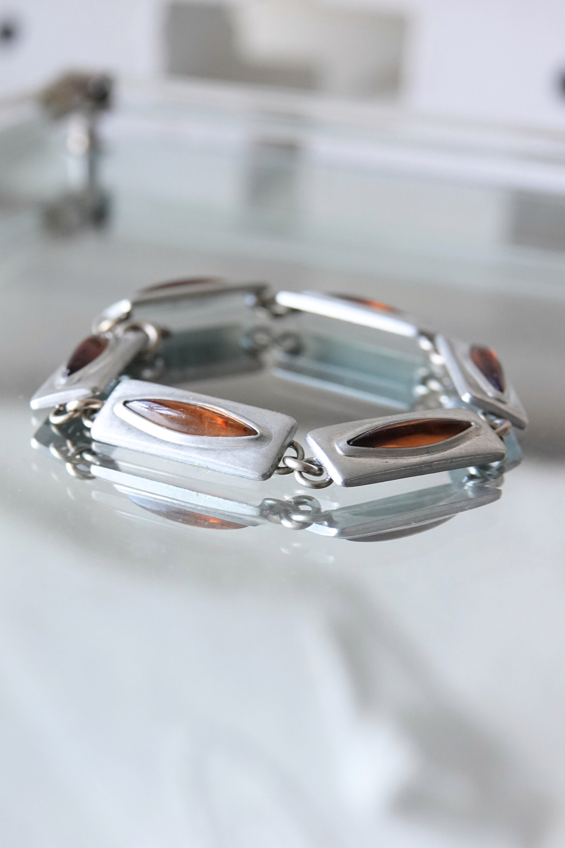 Jørgen Jensen pewter bracelet — close detail of rectangular pewter link and amber glass stone