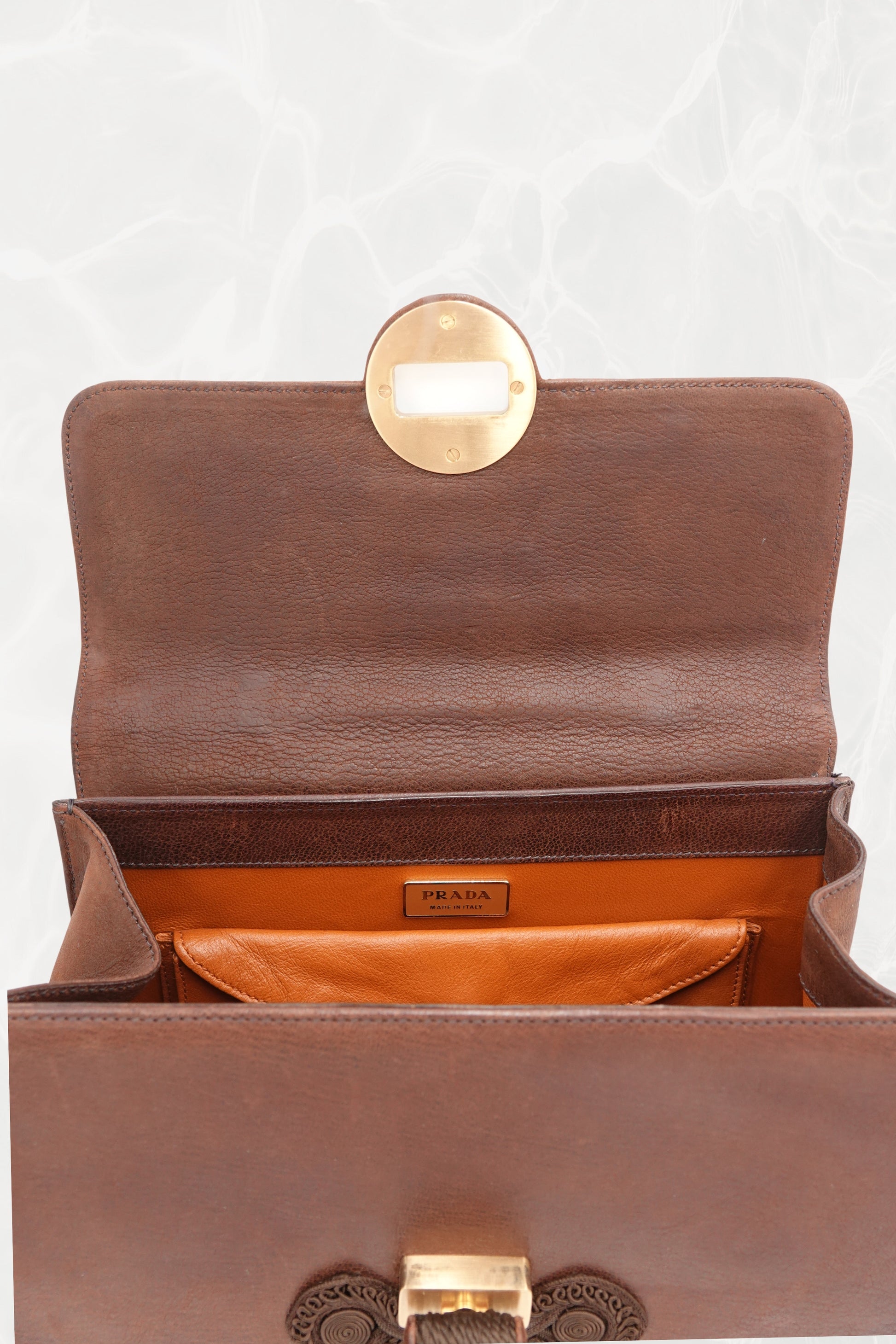 Vintage Prada Antic Passamane bag showing overall condition and rich brown patina