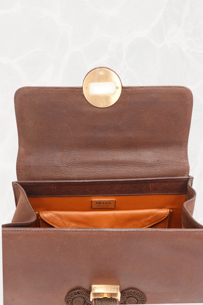 Vintage Prada Antic Passamane bag showing overall condition and rich brown patina
