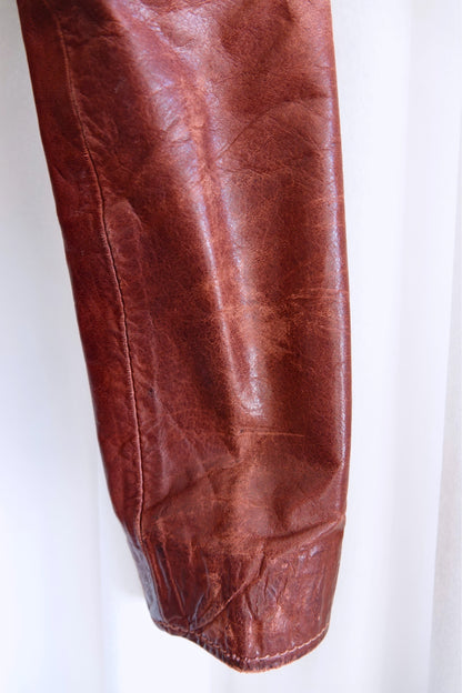 East West Musical Instruments 1970s burgundy leather jacket, condition reference — Disco Palma
