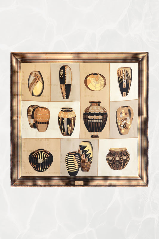 Fendi vintage silk scarf flat-lay: grid of 12 tribal pottery vessel illustrations, cream ground with brown striped border, Karl Lagerfeld era