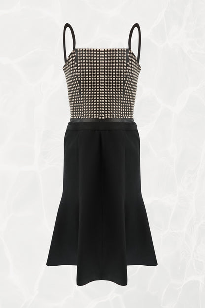 Loewe by Narciso Rodriguez AW01 studded leather dress front view: full metal-studded leather corset bodice with elastic shoulder straps and paneled black silk flare skirt, AW2001