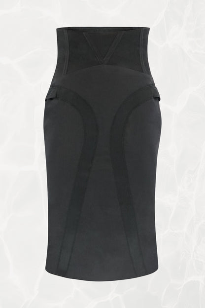 Tom Ford for Gucci FW03 black silk corset skirt front view: structured high waist with curved seam panel construction and side strap details, bias-cut pencil silhouette, Fall 2003