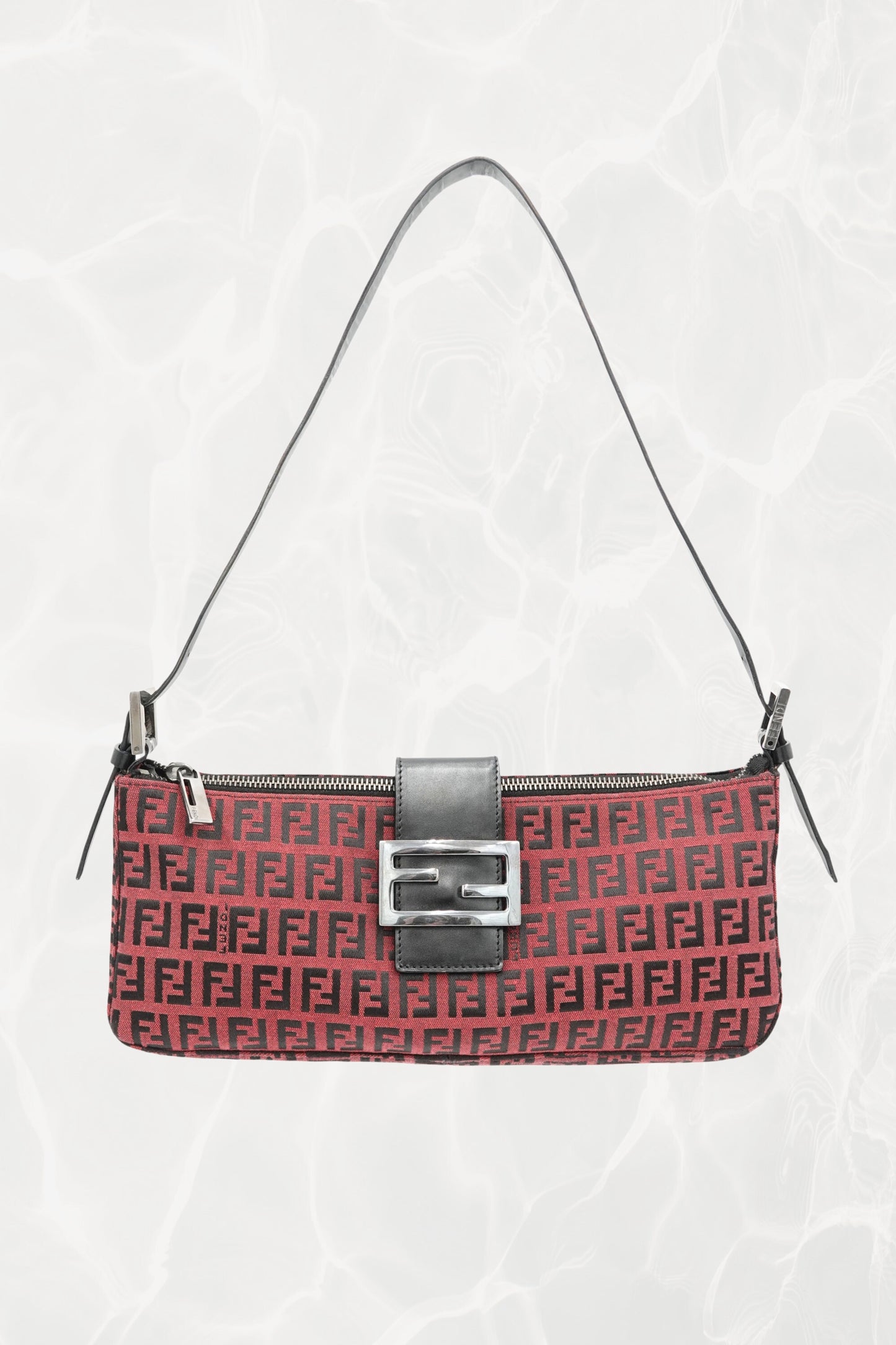 Fendi Zucchino FF monogram baguette, front view with black leather strap — Disco Palma