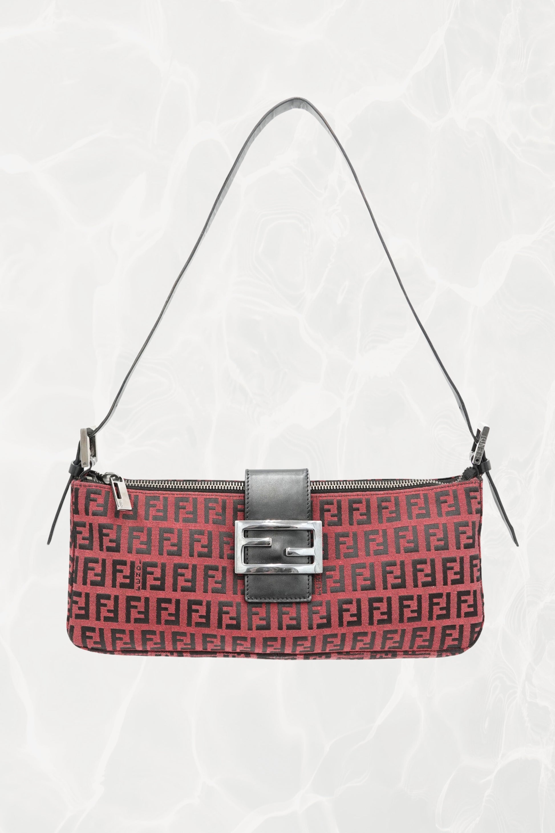 Fendi Zucchino FF monogram baguette, front view with black leather strap — Disco Palma