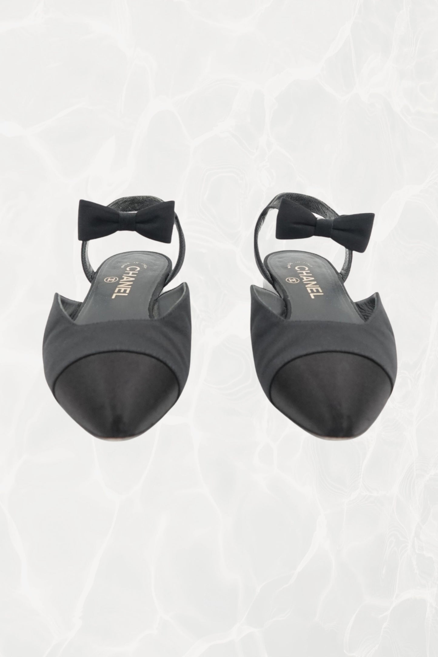Chanel black grosgrain and satin bow slingback flats, pair front view — Disco Palma