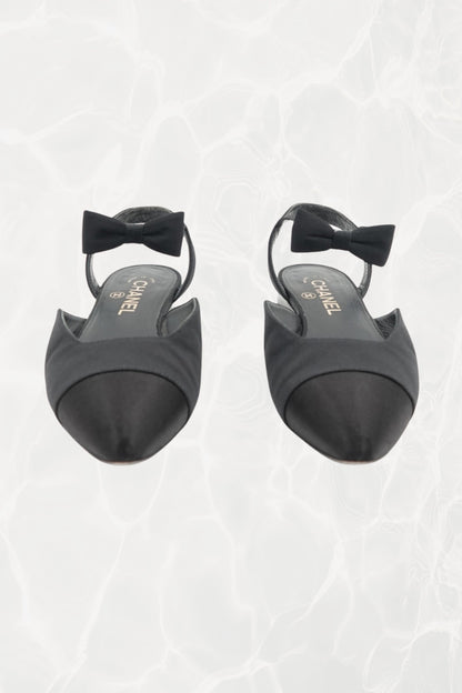 Chanel black grosgrain and satin bow slingback flats, pair front view — Disco Palma