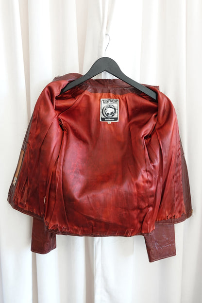 East West Musical Instruments 1970s burgundy leather jacket, condition reference — Disco Palma