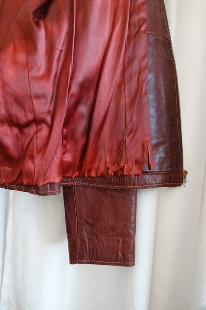 East West Musical Instruments 1970s burgundy leather jacket, condition reference — Disco Palma