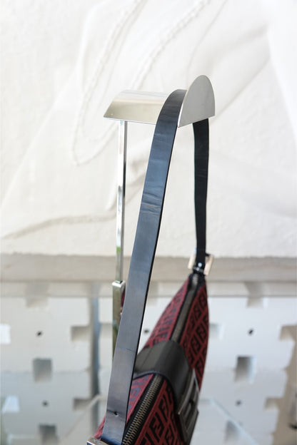 Fendi Zucchino FF monogram baguette, side profile on display stand — Disco Palma