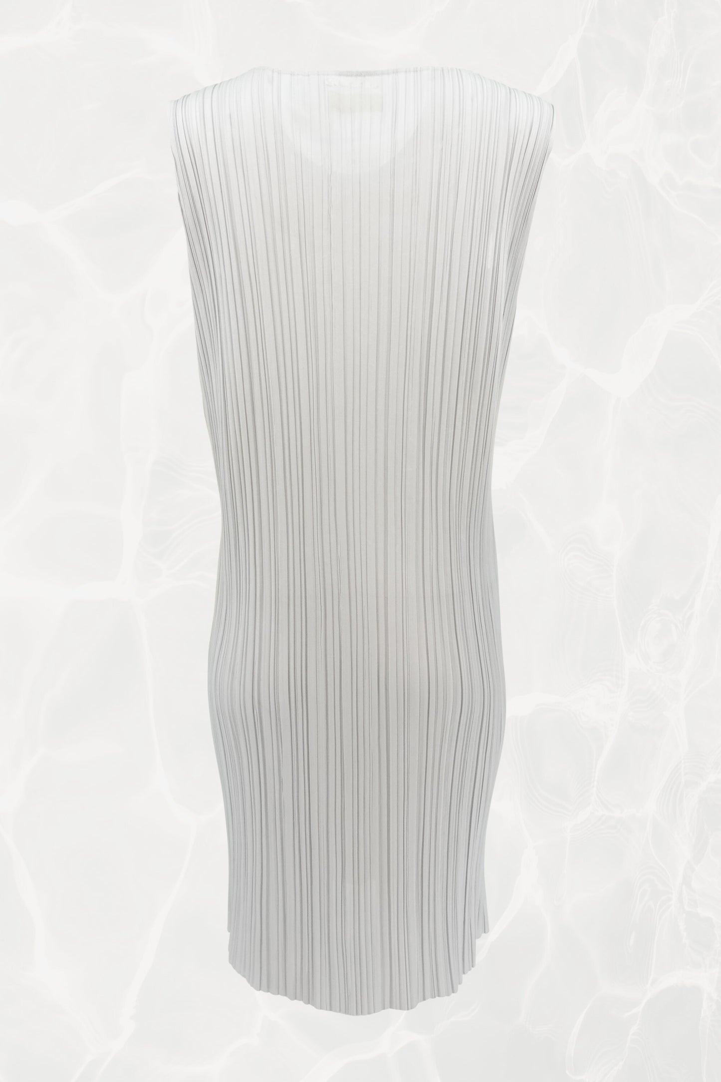 Pleats Please Issey Miyake x Mimi Yokoo carnation print dress back view: full-length rear view showing sculptural white pleated fabric silhouette, sleeveless, c. 2000