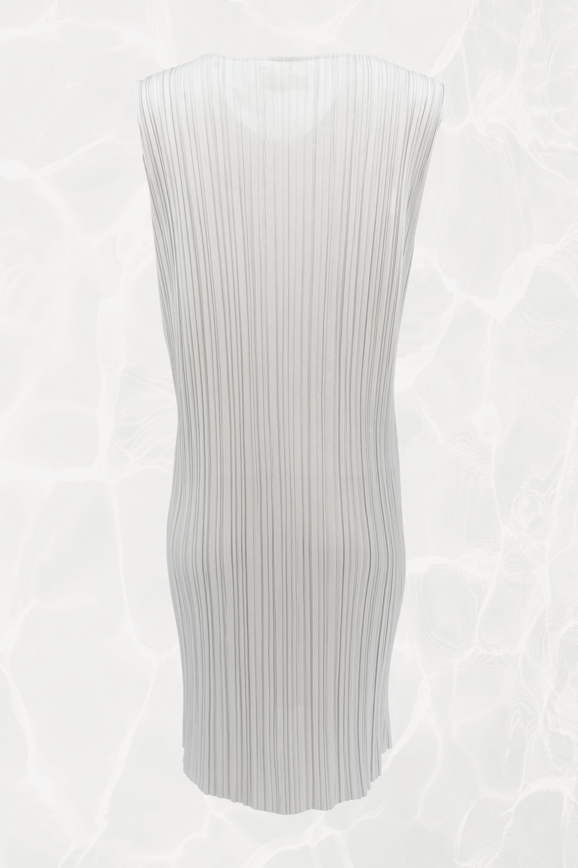 Pleats Please Issey Miyake x Mimi Yokoo carnation print dress back view: full-length rear view showing sculptural white pleated fabric silhouette, sleeveless, c. 2000