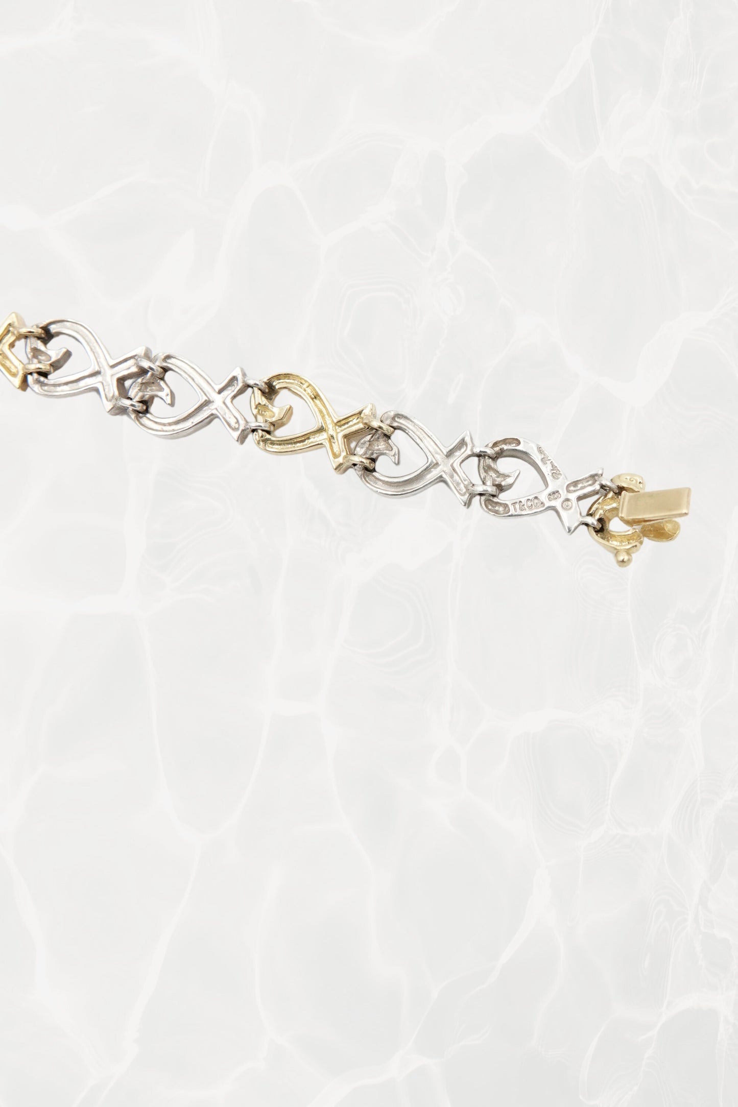 Paloma Picasso for Tiffany & Co. Loving Heart link bracelet: detail of Tiffany & Co. maker's mark and Paloma Picasso signature engraving on reverse of link
