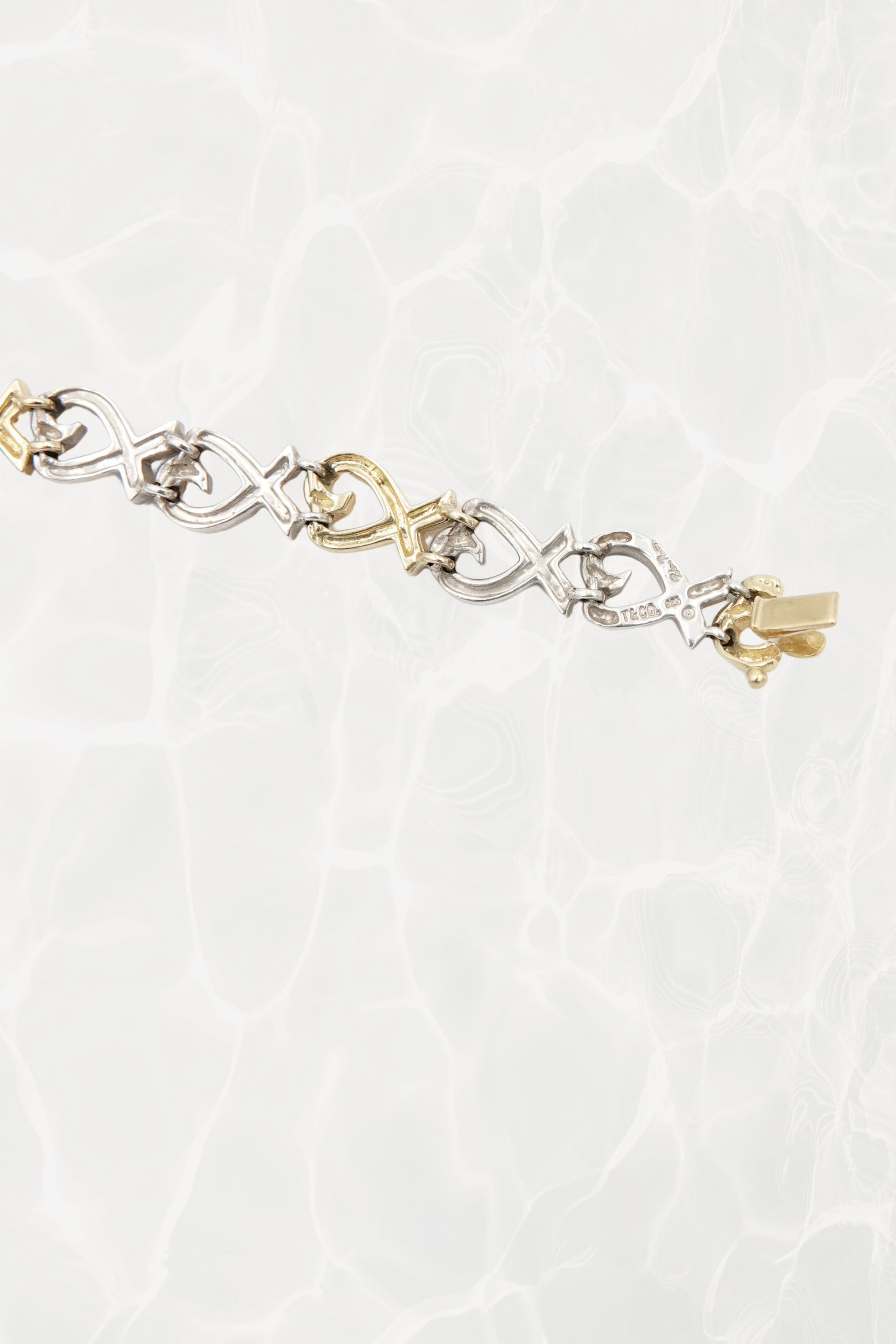 Paloma Picasso for Tiffany & Co. Loving Heart link bracelet: detail of Tiffany & Co. maker's mark and Paloma Picasso signature engraving on reverse of link