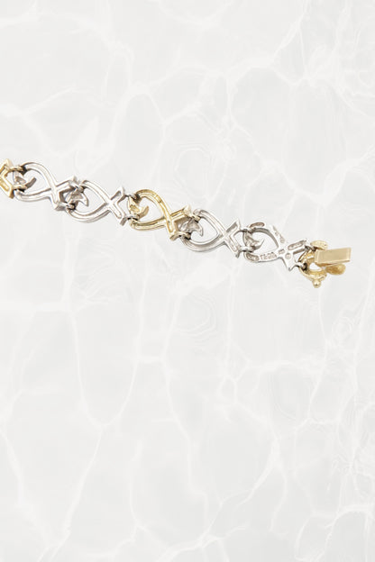 Paloma Picasso for Tiffany & Co. Loving Heart link bracelet: detail of Tiffany & Co. maker's mark and Paloma Picasso signature engraving on reverse of link