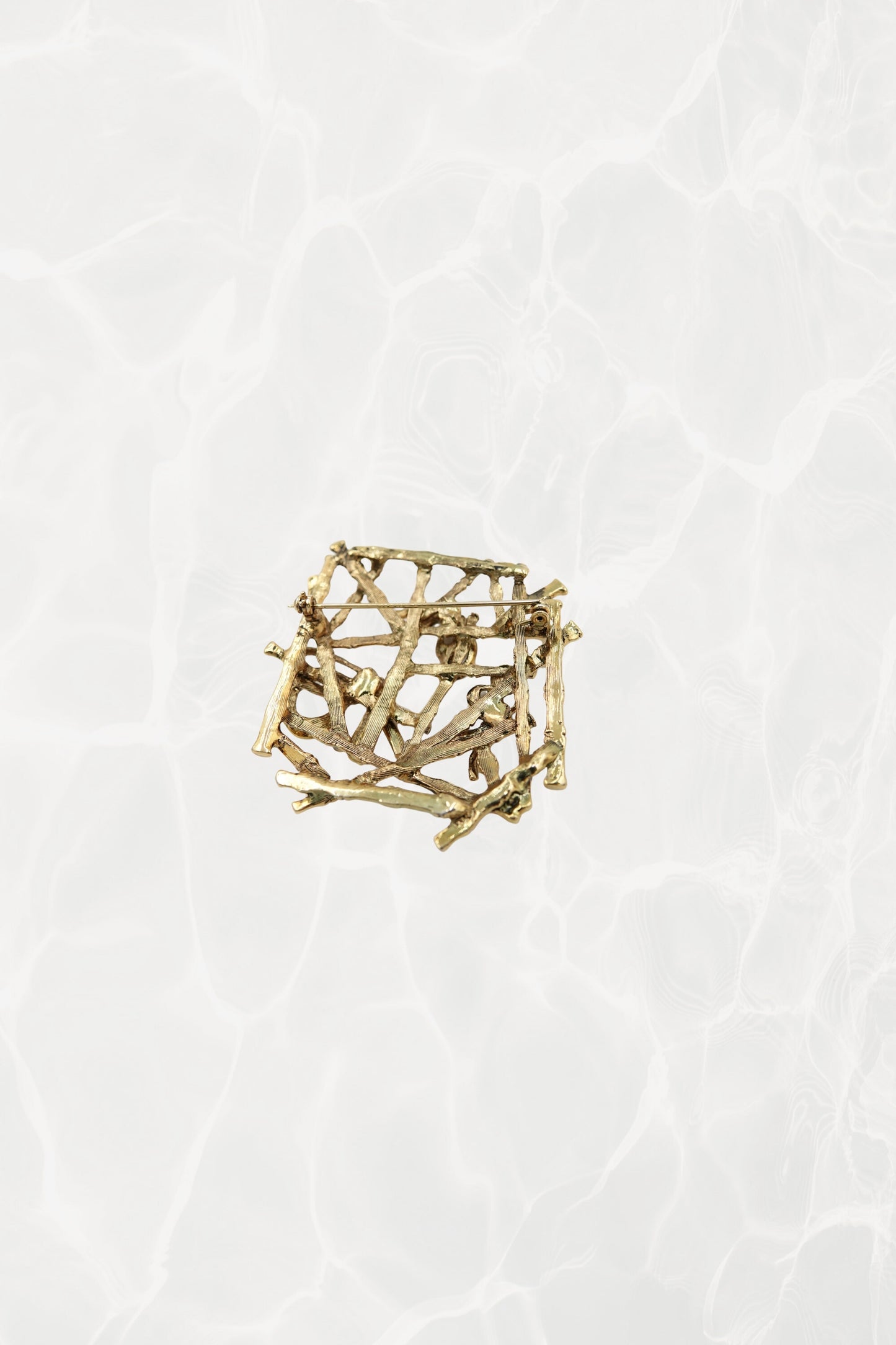 Gold bamboo brooch — back view showing pin mechanism