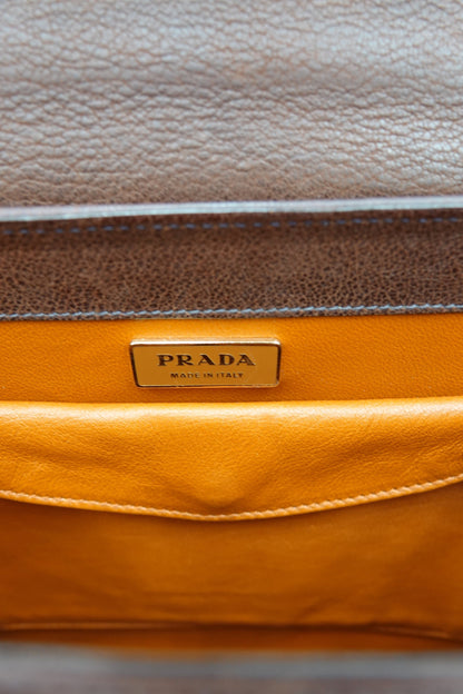 Vintage Prada Antic Passamane brown goat leather top handle bag, front showroom view — Disco Palma