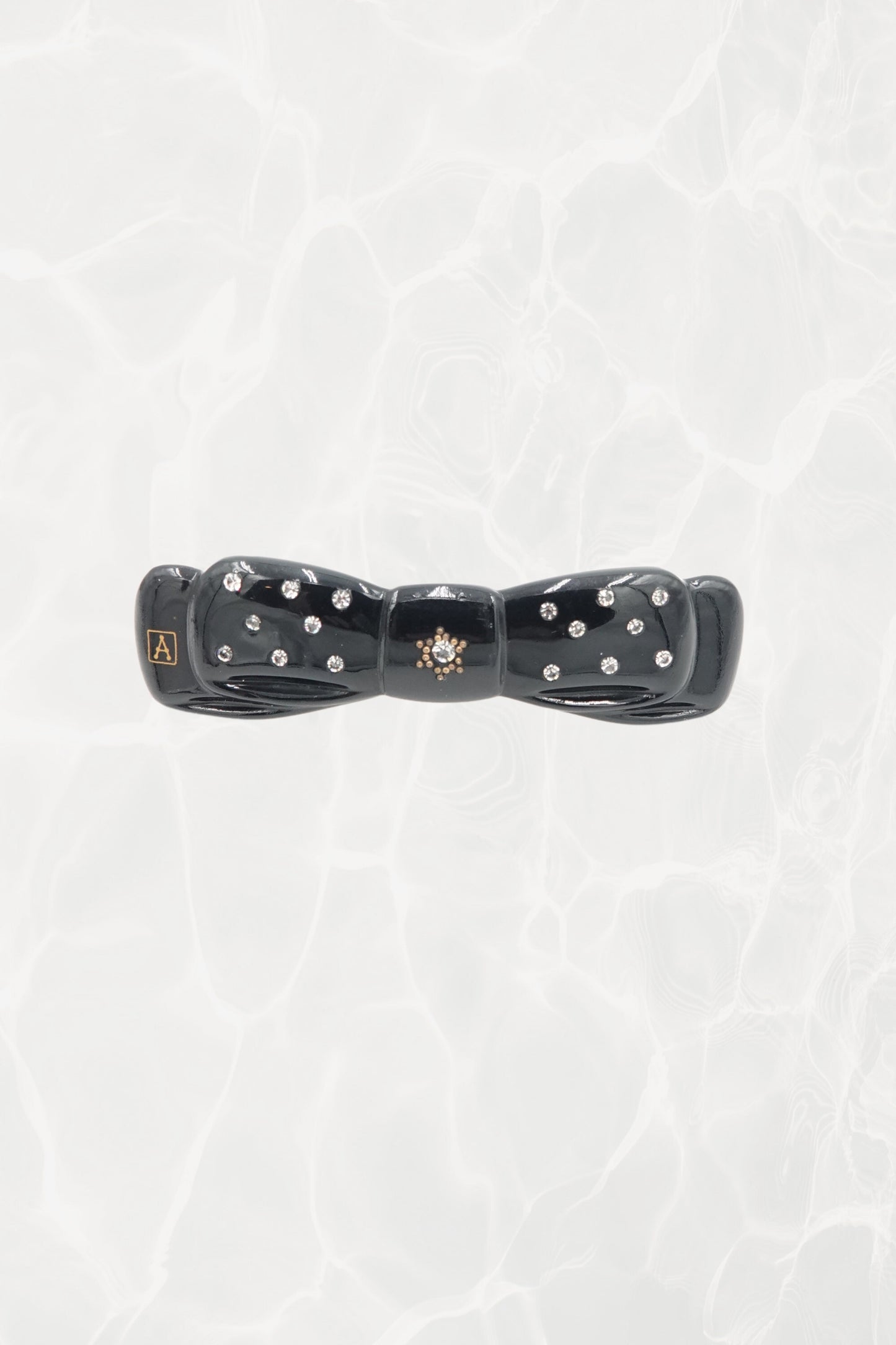 Alexandrine Paris rhinestone bow barrette — hero front view showing A logo and rhinestones