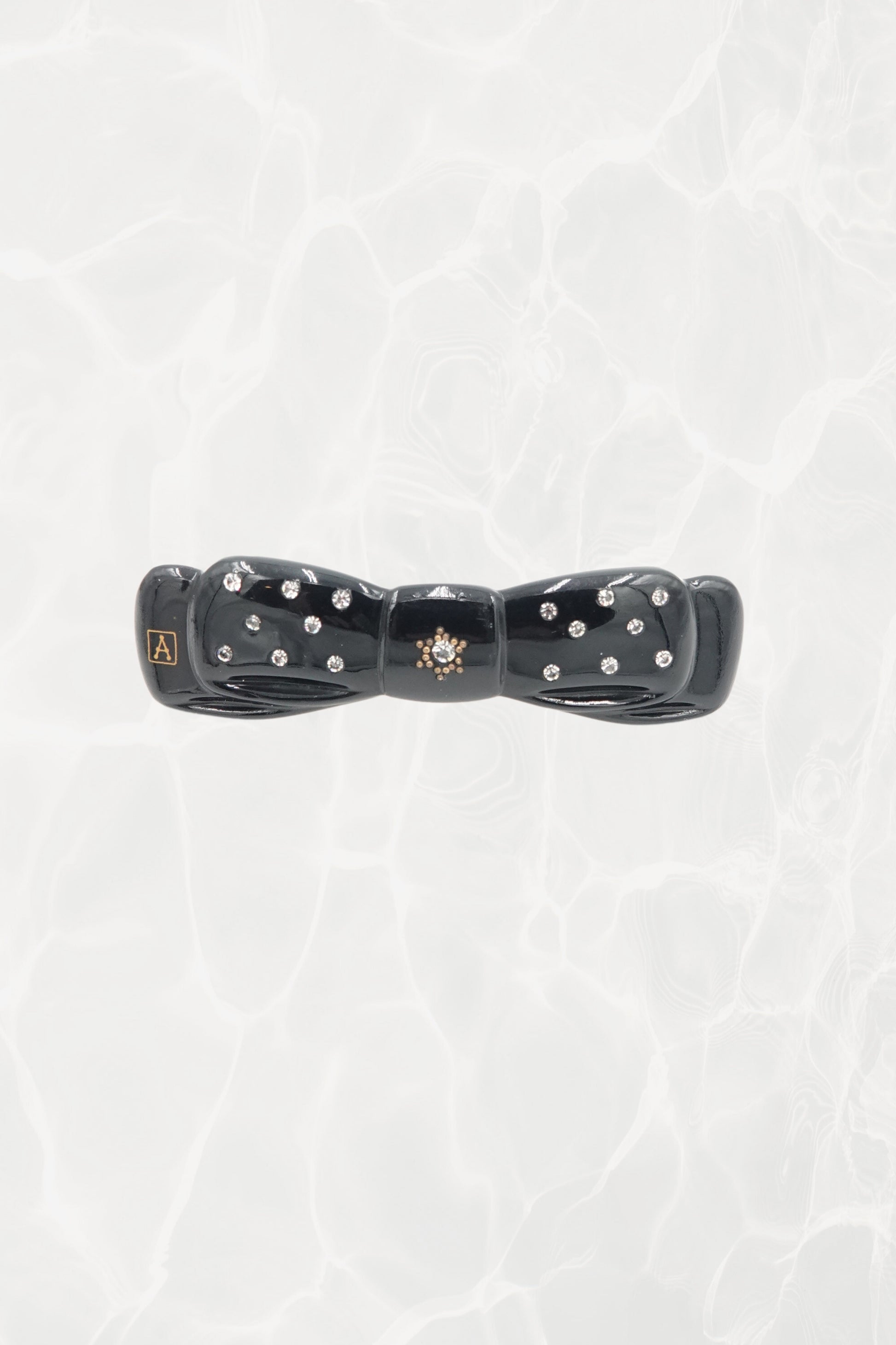 Alexandrine Paris rhinestone bow barrette — hero front view showing A logo and rhinestones