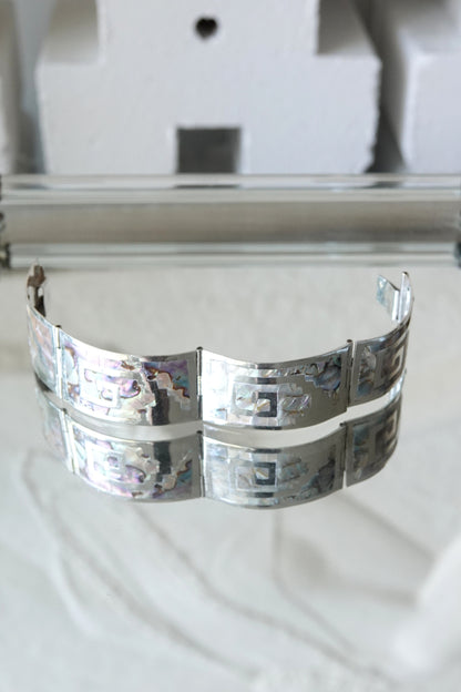 Vintage Taxco Mexican sterling silver Greek key abalone cuff bracelet, glass reflection