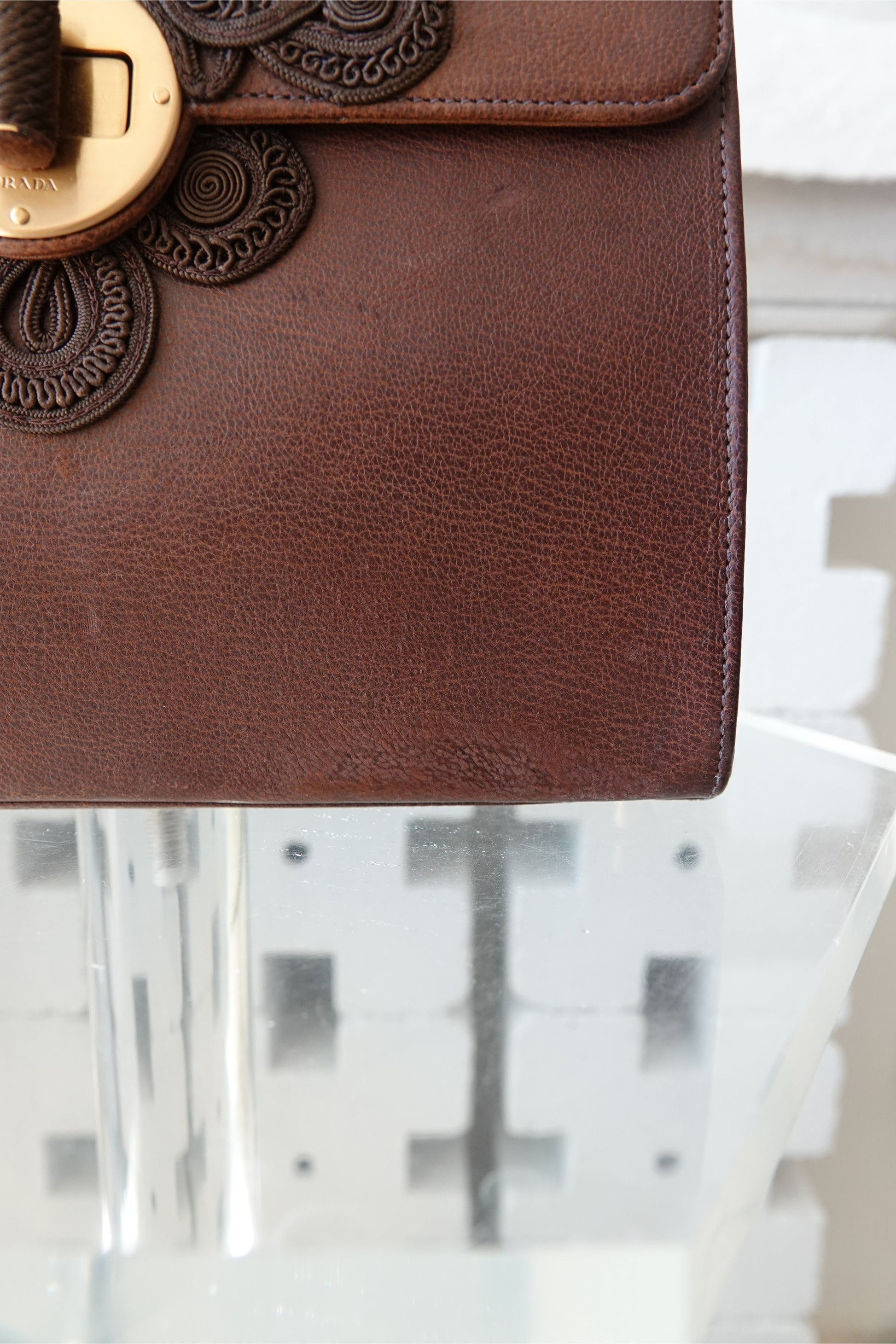 Prada Antic Passamane brown leather bag, showroom detail view — Disco Palma